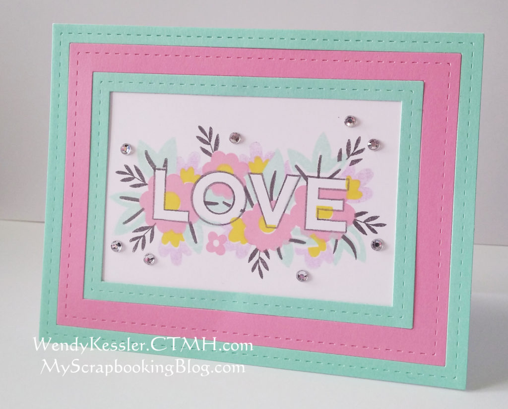 This card is created using a multi-step stamp by Close to My Heart with the word Love, in addition to the new Thin Cut Rectangle Frames.
